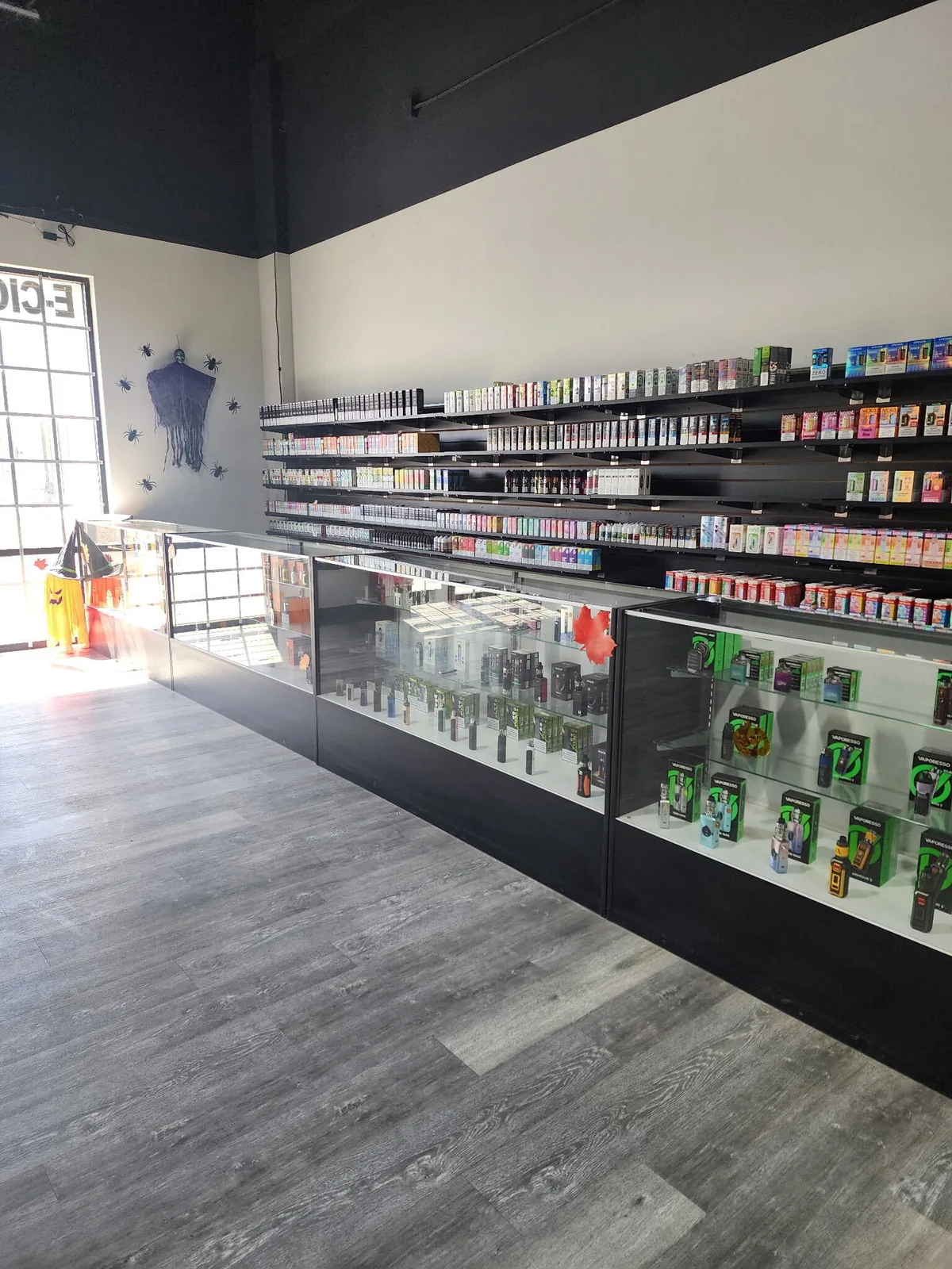 Vaporesso kits along the counter