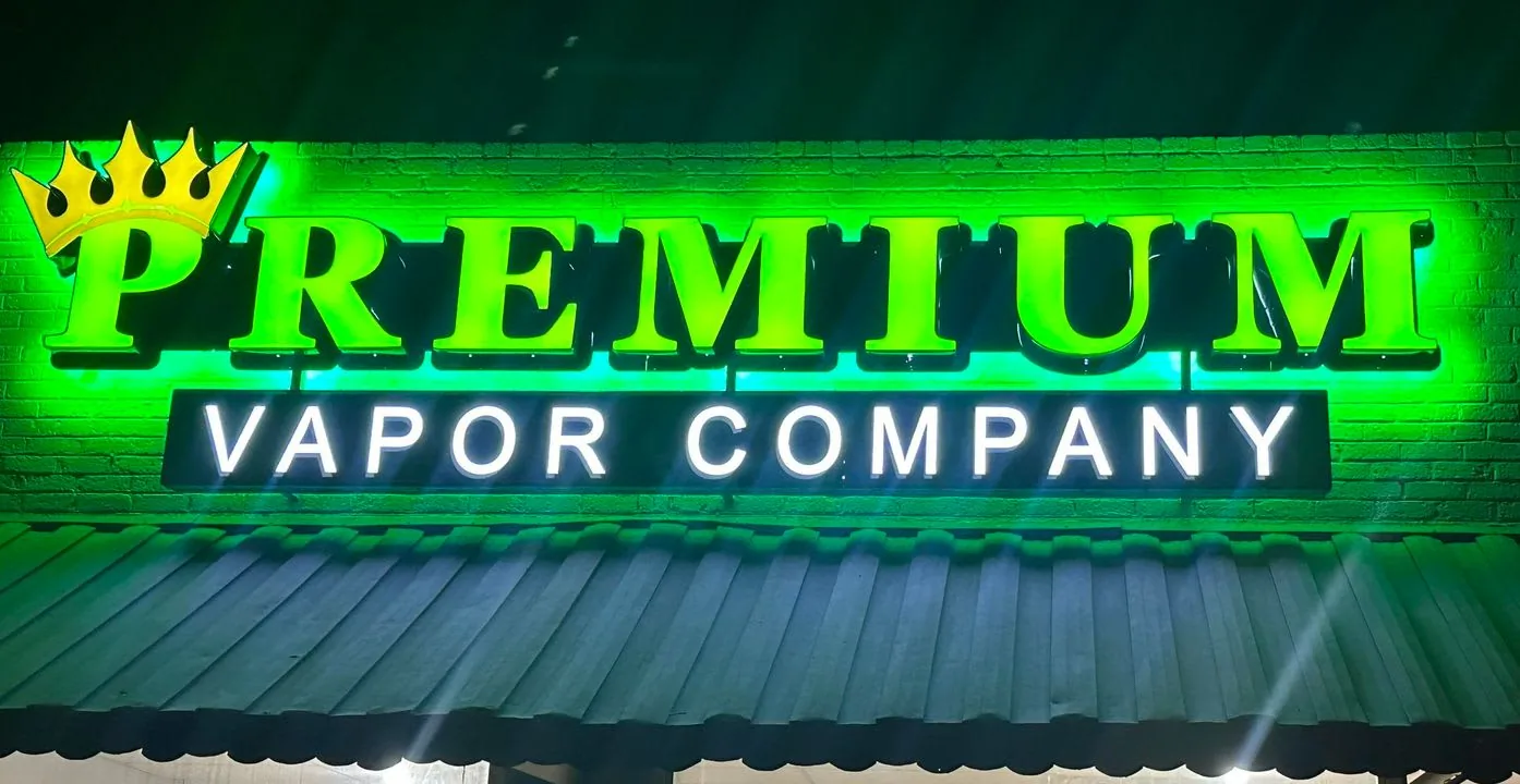 Premium Vapor Company sign after dark